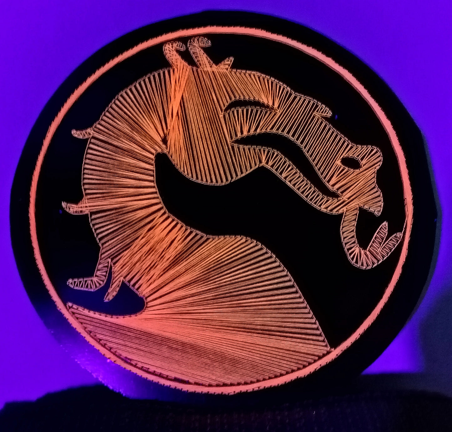handmade Mortal Kombat dragon logo string art, is UV reactive string art, copper thread geometric line art, LED backlit wall artwork