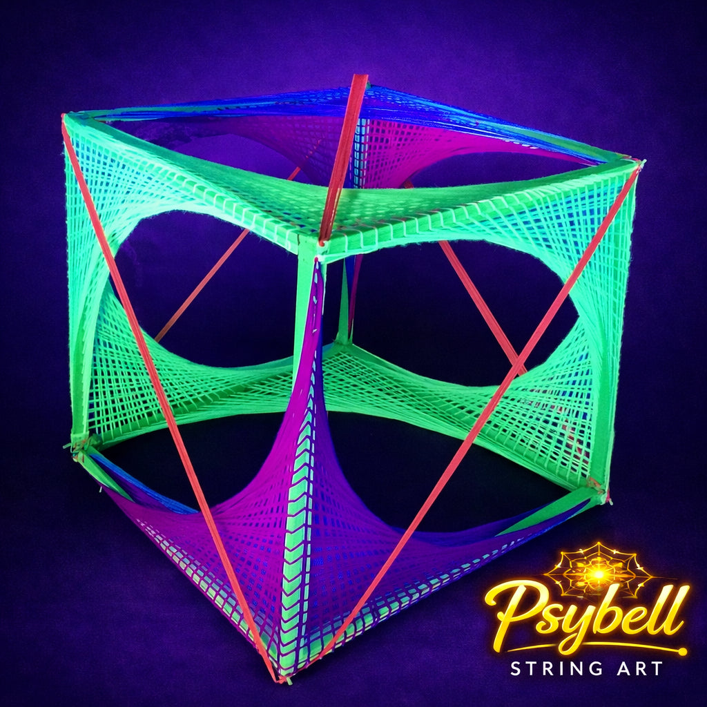 UV string art 3D cube by Psybell featuring complex cotton yarn weaving through precision drilled structure forming intricate parabolic patterns