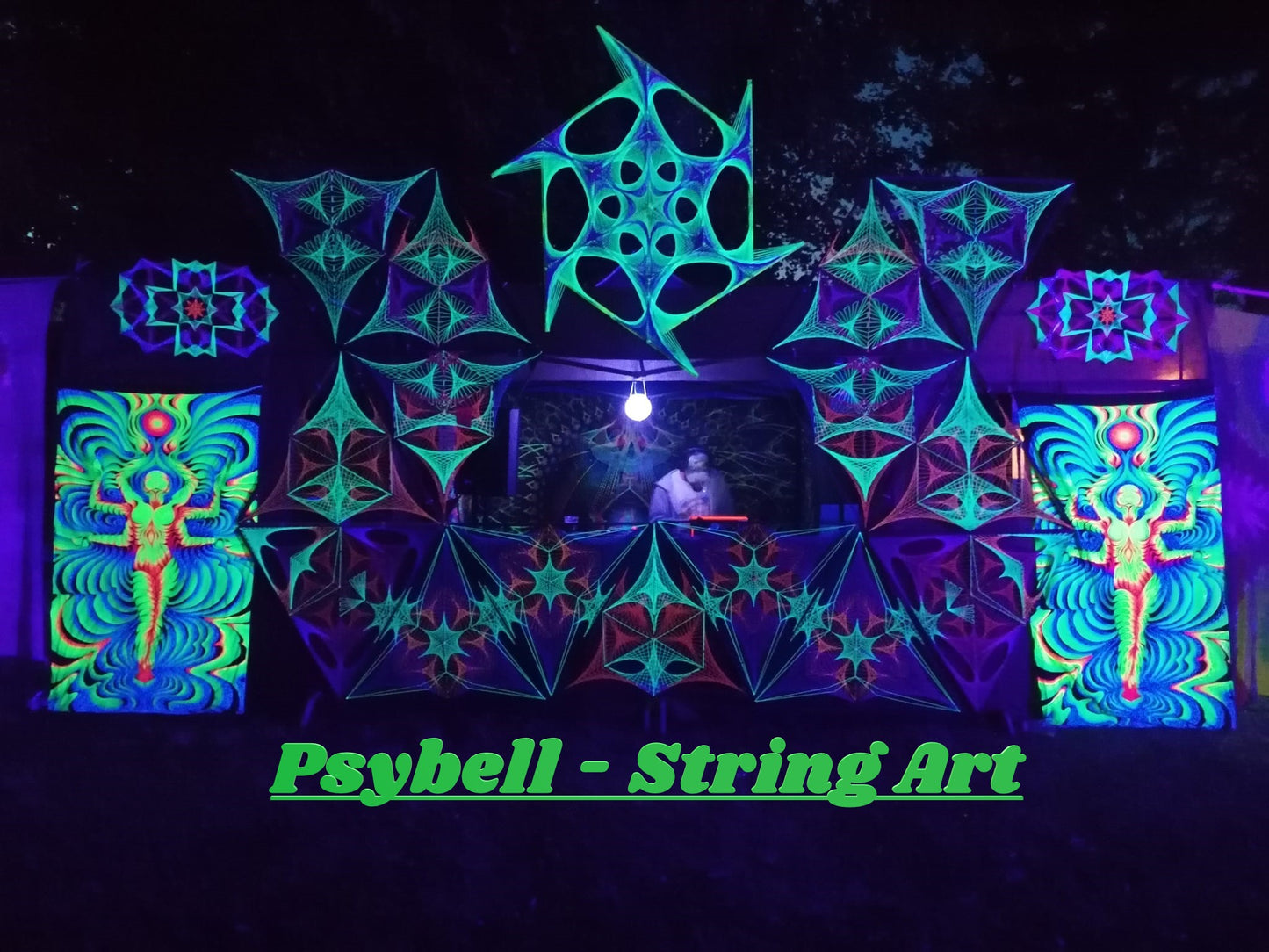 handmade UV reactive string art stage composed of sixteen triangular panels with alien motifs, glowing under ultraviolet light, by Psybell
