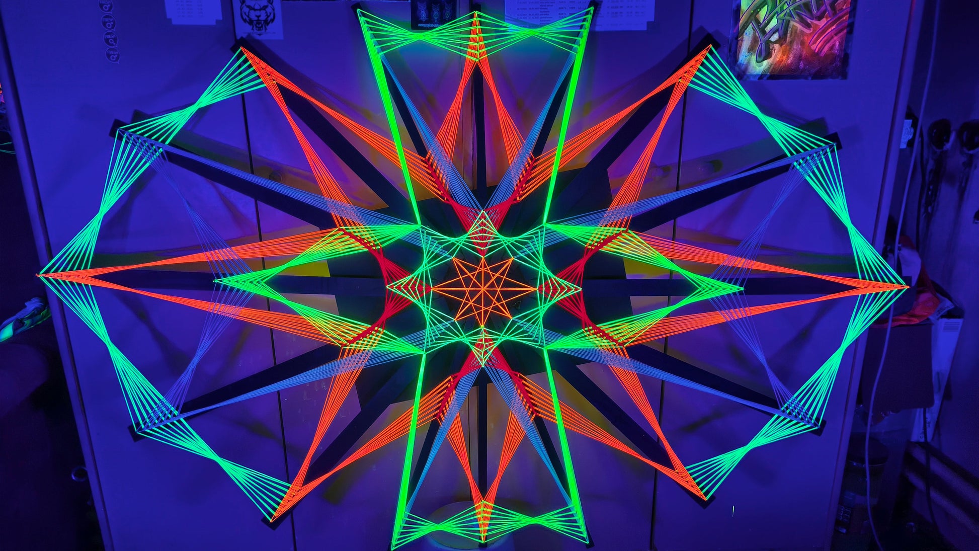 Colorsun string art artwork knitted on wooden slats, handmade geometric wall art made with colorful threads and reclaimed wood texture