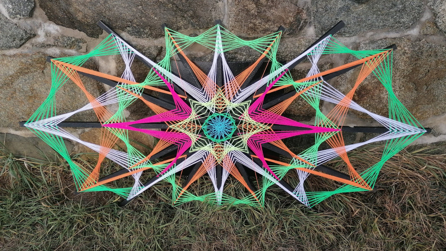 Colorsun string art mandala crafted on wooden slats, detailed geometry and vibrant threads captured in daylight, handmade wall art Psybell