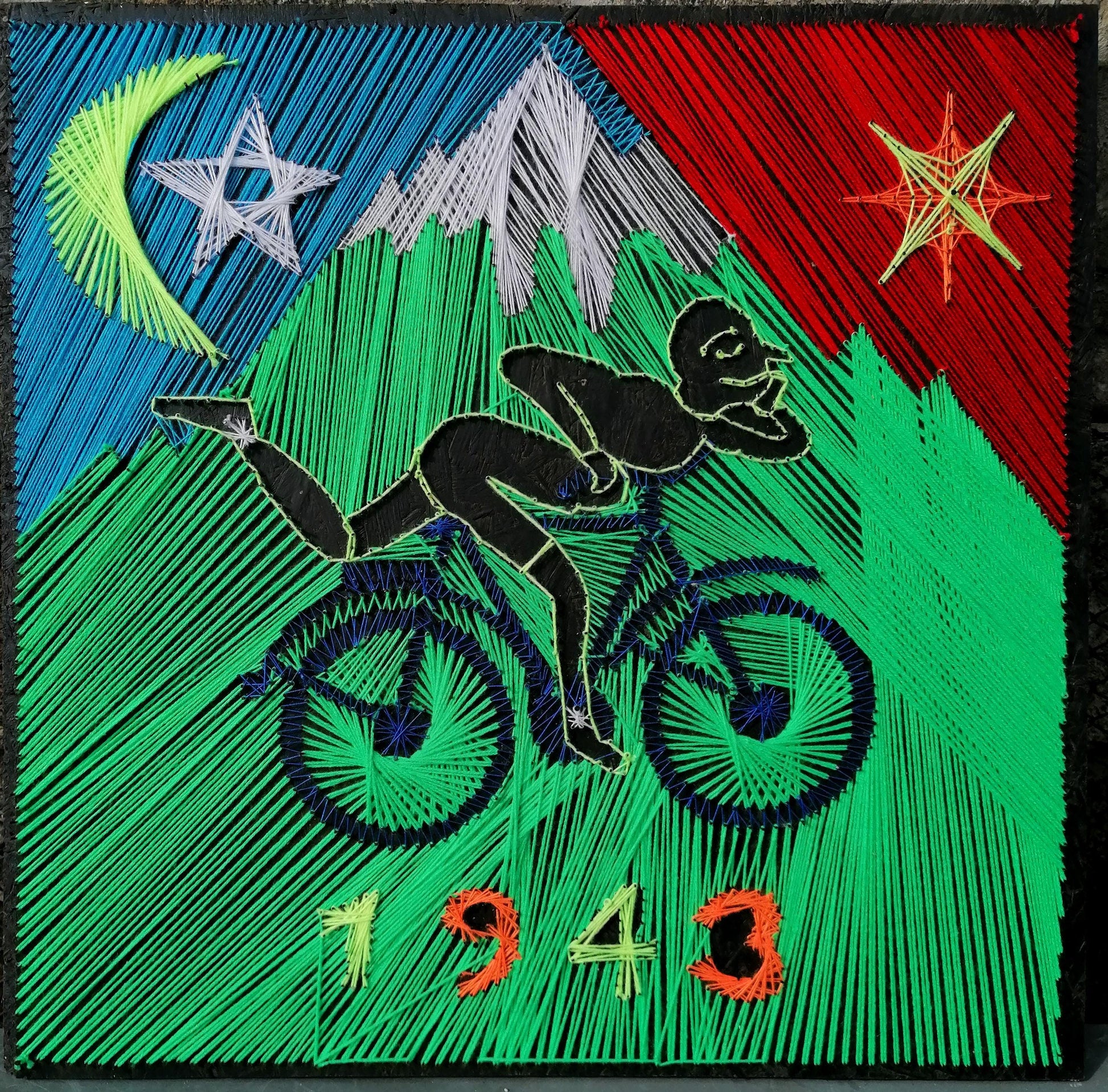 handmade psychedelic string art depicting cyclist silhouette inspired by Hofmann’s Trip, glowing geometric background with moon and stars, UV reactive threads on black board, modern wall art, Psybell