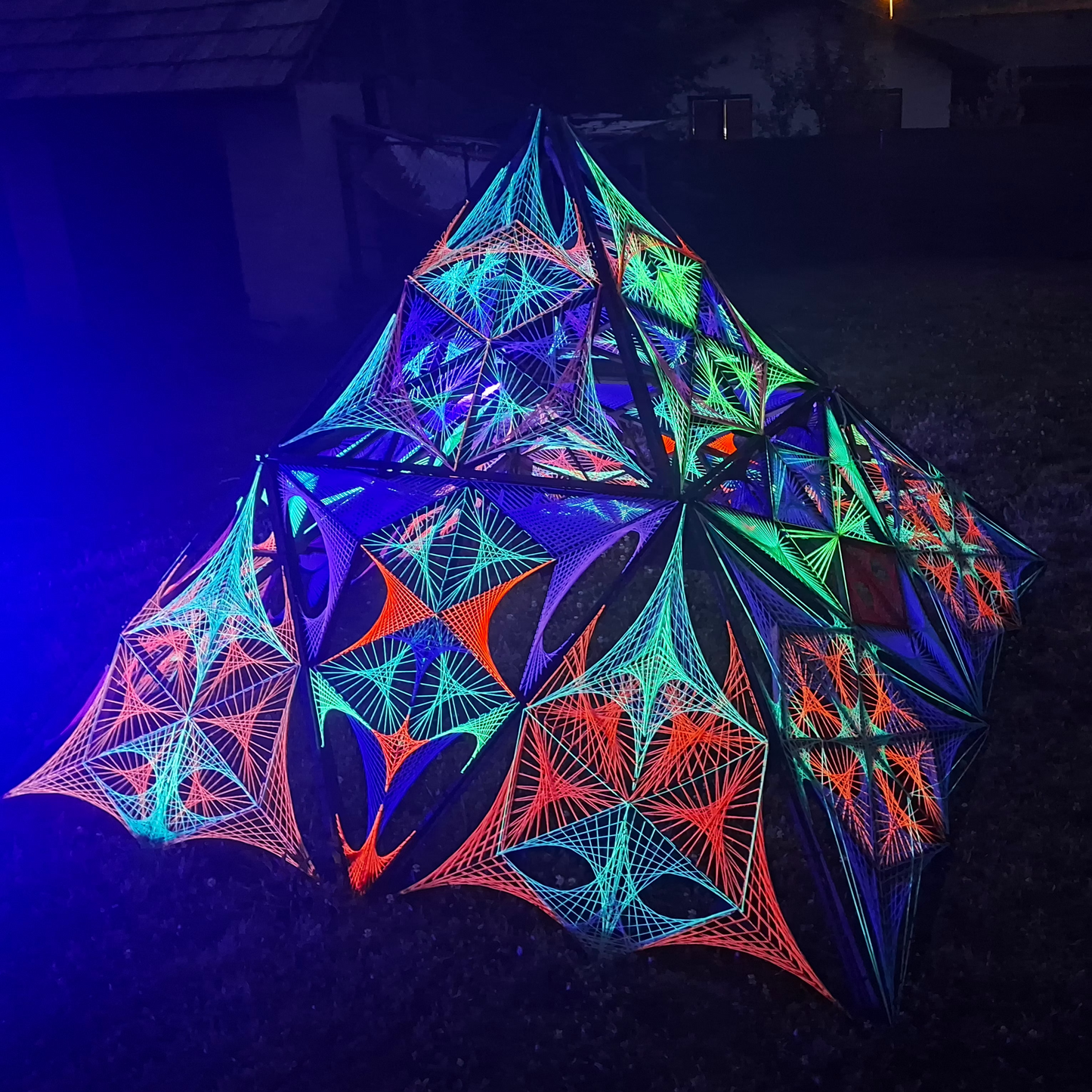 Psybell Pyramid UV reactive 3D string art, glowing geometric pyramid sculpture made with neon threads, handmade modular UV installation