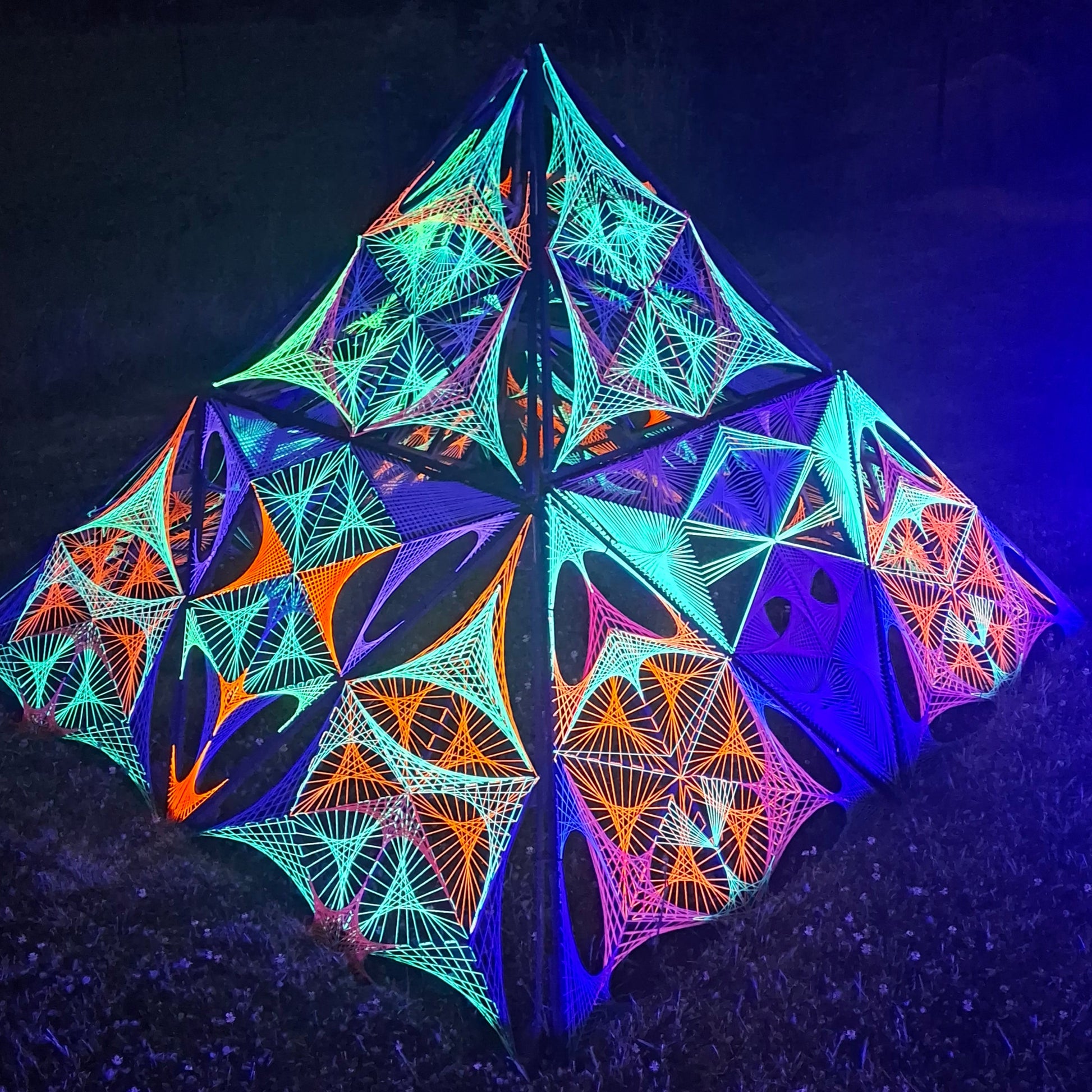 Psybell Pyramid UV reactive 3D string art, glowing geometric pyramid sculpture made with neon threads, handmade modular UV installation