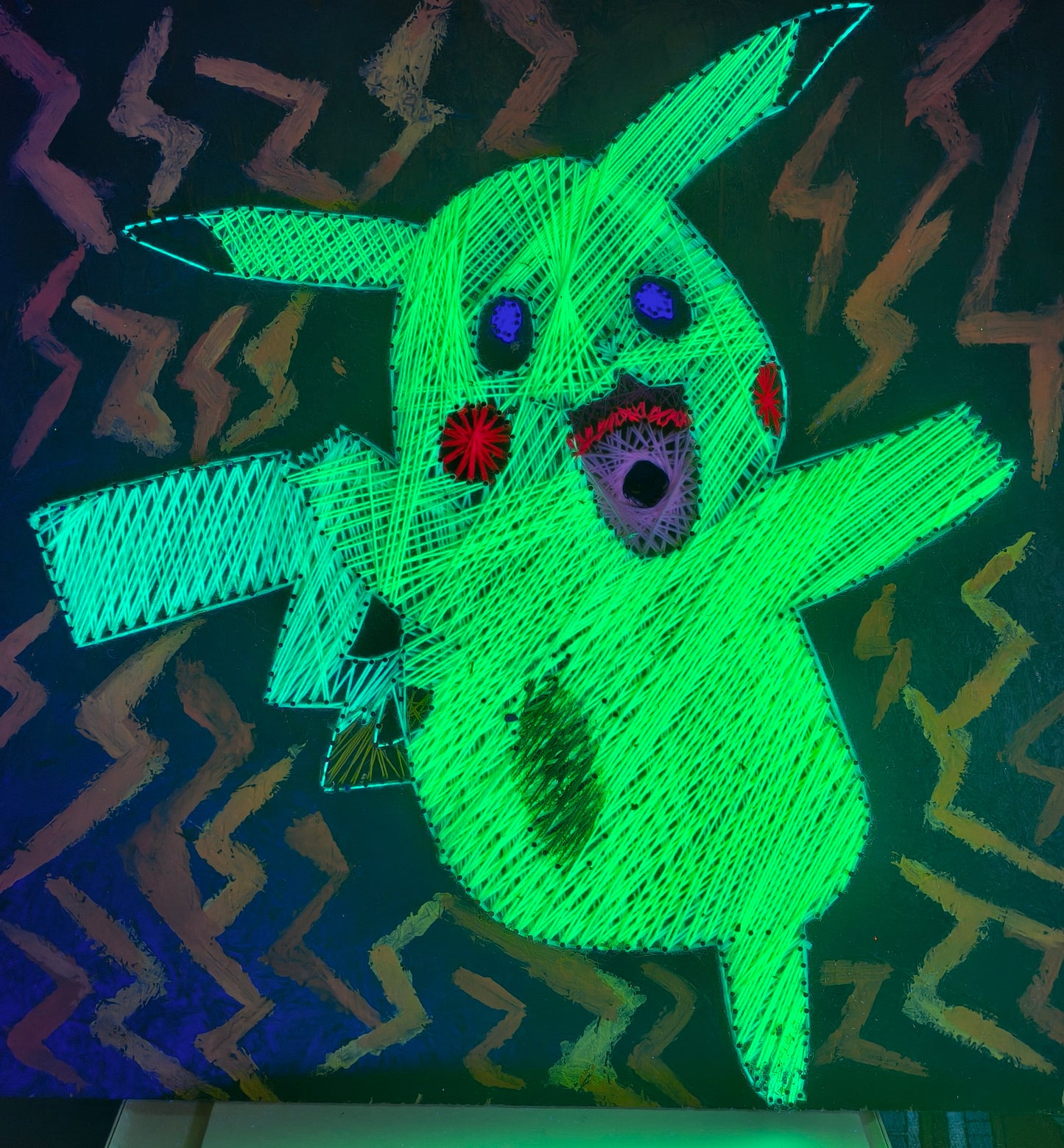 handmade string art portrait of Pikachu, geometric thread artwork with yellow and black lines on light background, pop culture wall art, Psybell