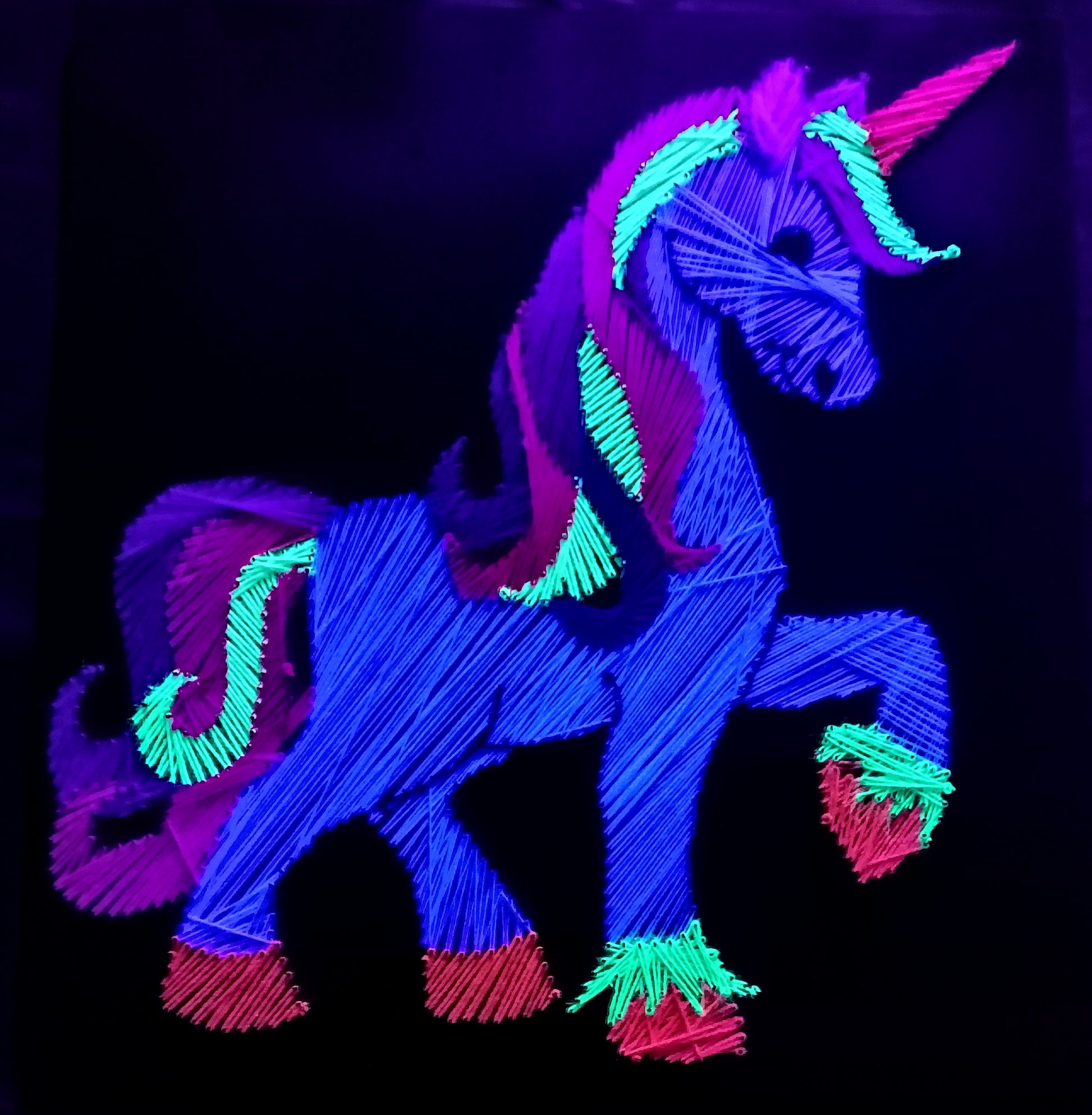 Visionary handmade UV reactive unicorn string art. A glowing symbol of fantasy, freedom and psychedelic aesthetics, crafted with love and harmony.
