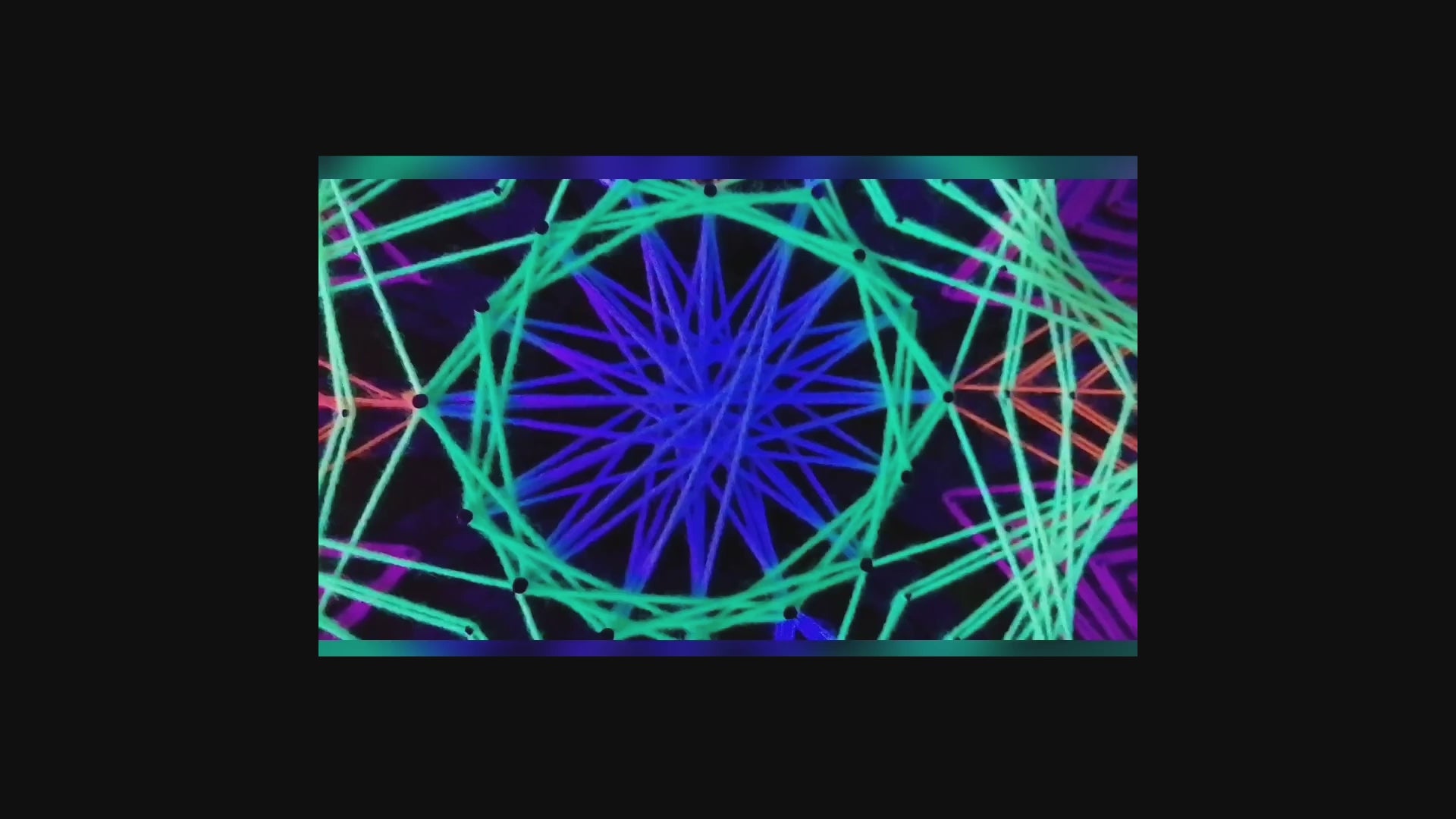 UV reactive Colorsun string art detail captured on video, glowing threads and geometric mandala pattern under ultraviolet light, handmade artwork by Psybell